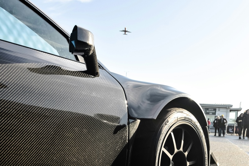 Balancing Weight Reduction and High-Speed Stability in Performance Cars